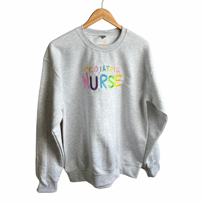 Embroidered Pediatric Nurse Rainbow Crewneck